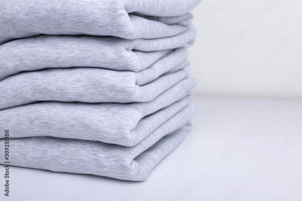 Stack of blank colorful sweatshirts closeup Stack of blank colorful sweatshirts closeup