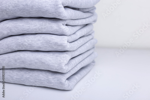 Stack of blank colorful sweatshirts closeup