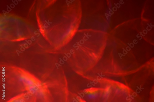 Red glowing defocused abstract background with copy space