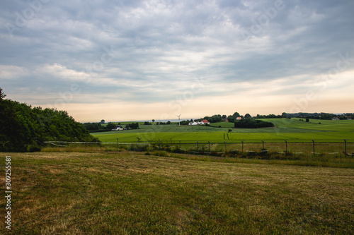 Landscape with field and blue sky