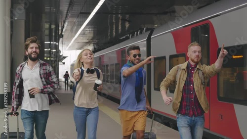 Friends tourists chasing train being late