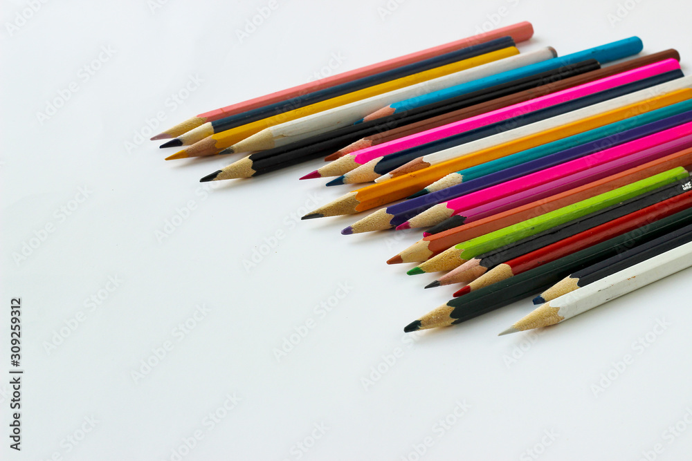 Drawing pencils and a sketchpad notebook Drawing pencils and a sketchpad notebook