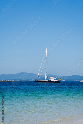 A sailboat near a beach