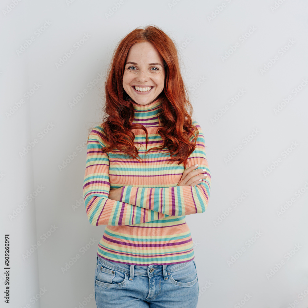 Happy casual young woman with beaming smile Happy casual young woman with beaming smile