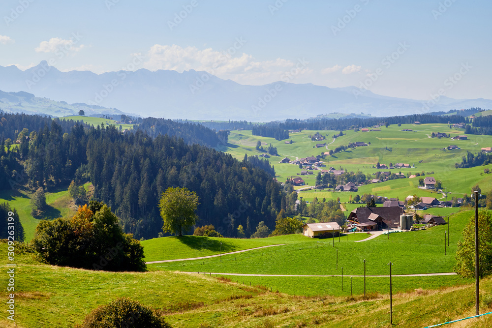 Mountain landscape with valley below. View from height Mountain landscape with valley below. View from height