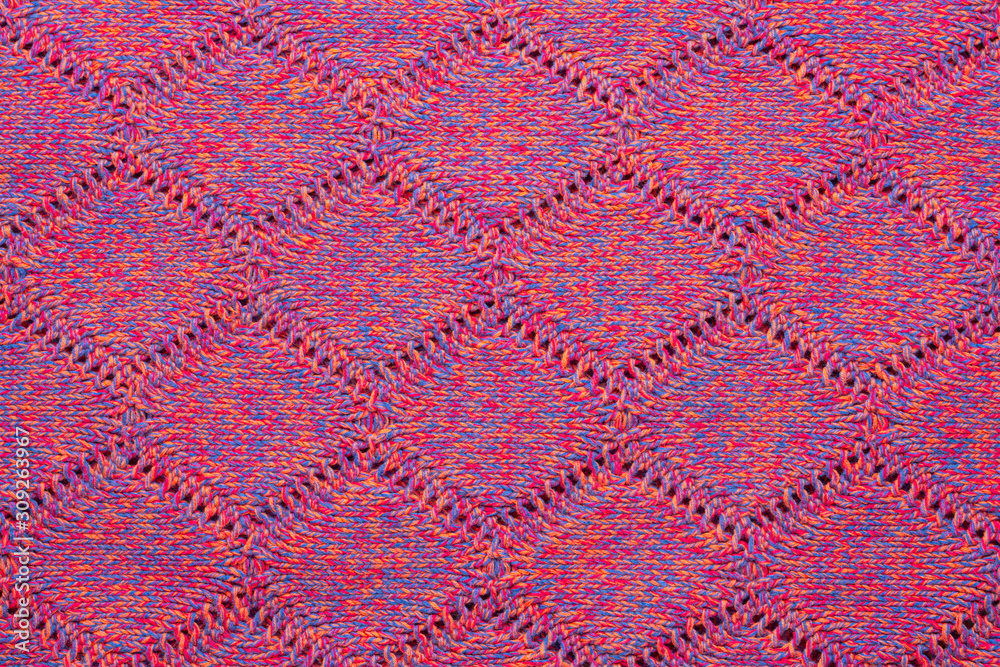 Knitted sweater texture. Pink melange pattern. Background. Copy space