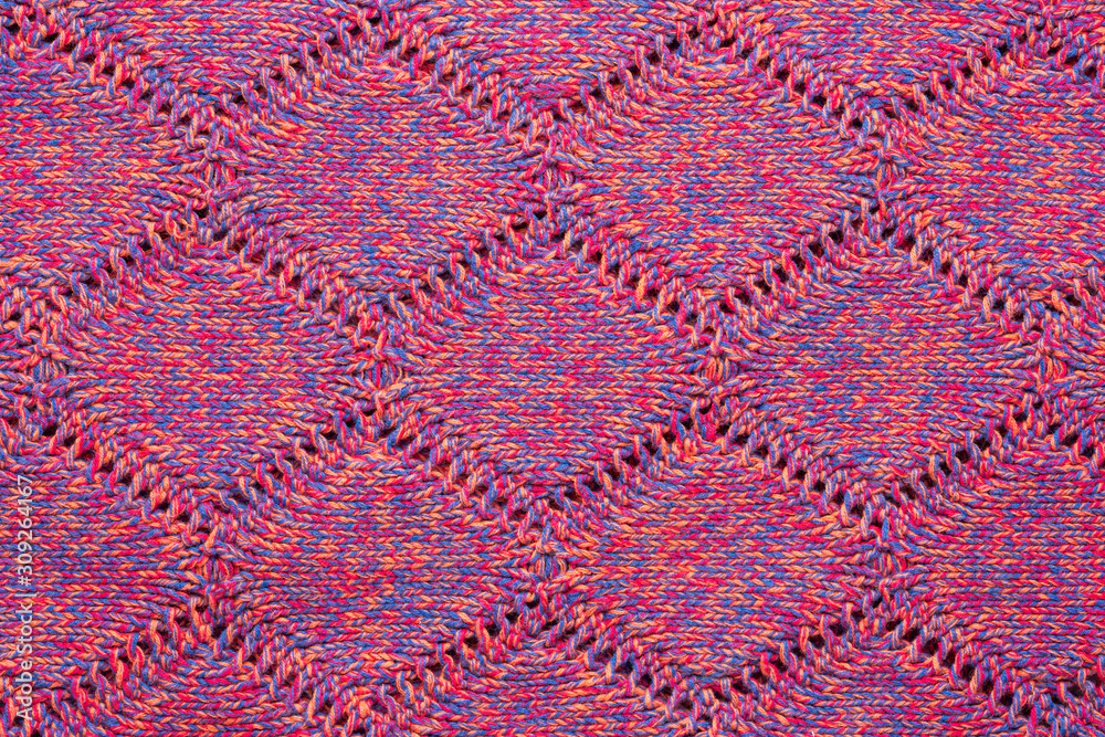 Knitted sweater texture. Pink melange pattern. Background. Copy space Knitted sweater texture. Pink melange pattern. Background. Copy space