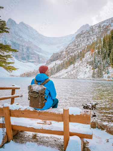 Lake Anette, Lake Louise Banff national park, young couple by the lake at the Canadian Rockies Canada photo