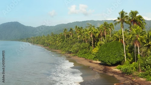 Beach of the Pacific Ocean with rainforest in Choco, Colombia, near Nuqui, drone aerial view photo