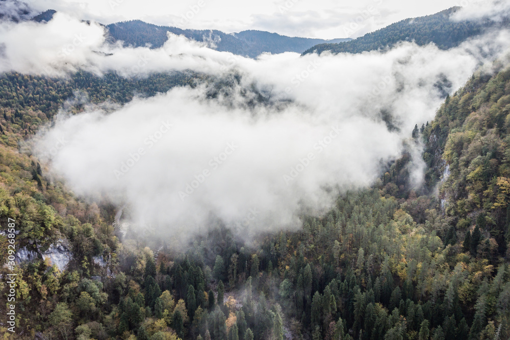 Beautiful mountains in the clouds. Aerial Beautiful mountains in the clouds. Aerial