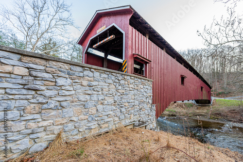 Colemanville Covered Bridge Crossing Pequea Creek in Lancaster County, Pennsylvania photo