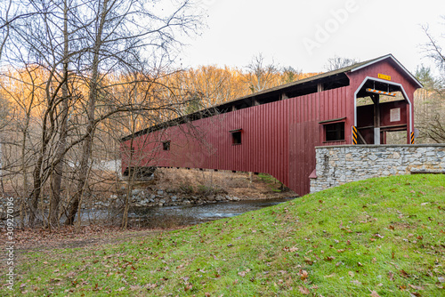 Colemanville Covered Bridge Spanning Pequea Creek in Lancaster County, Pennsylvania photo