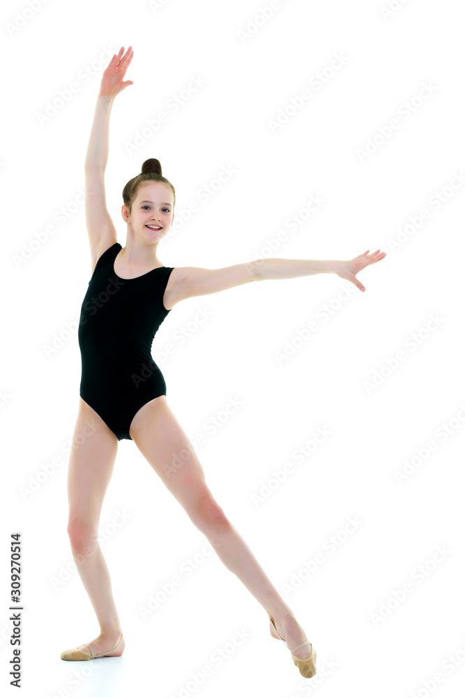 Fototapeta premium The gymnast perform an acrobatic element.