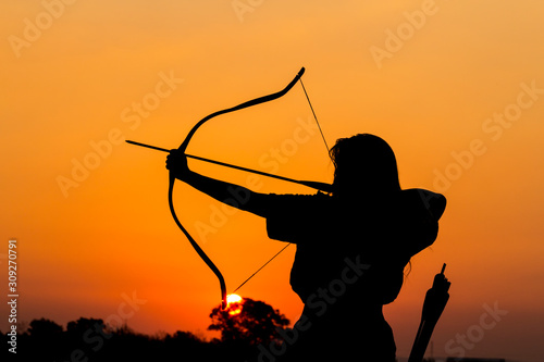 Canvas Print the archer whose arm appears to be and