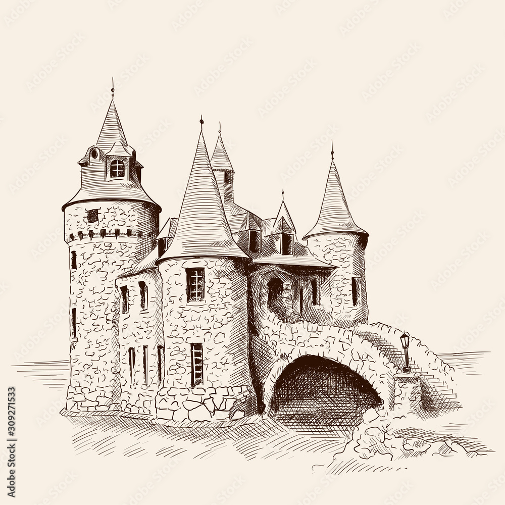 Medieval stone castle with towers by the sea and a bridge.