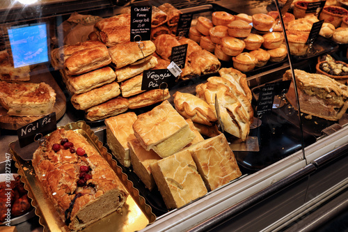 Selection of savoury pastries and pies in a butchers shop