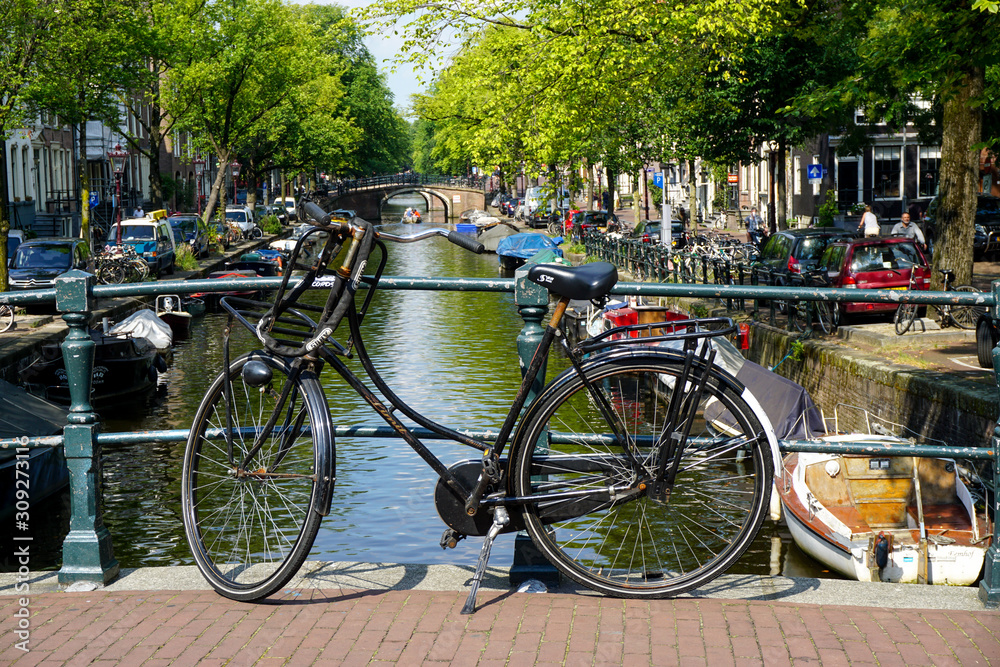 Bike on bridge over canal