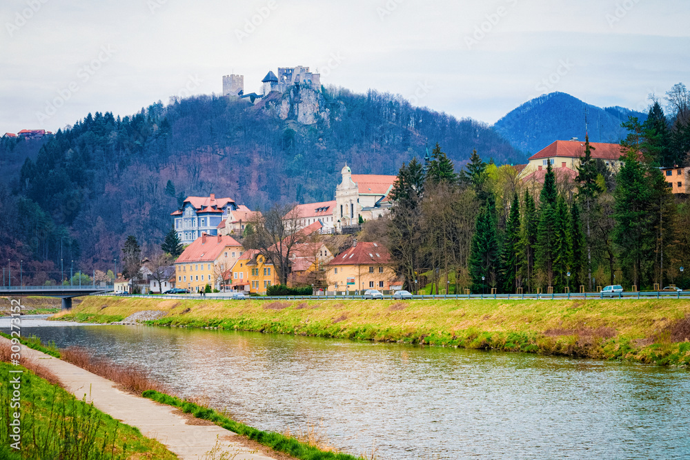 Fototapeta premium Landscape with Savinja River and Celje castle in Slovenia