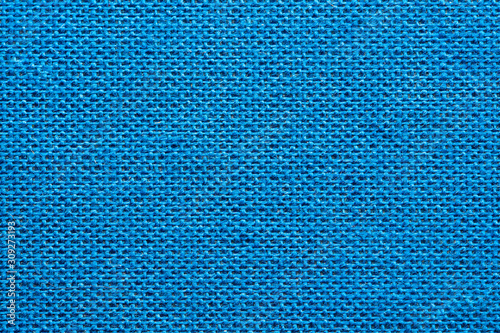 Macro texture of blue cloth book cover. The textbook close-up. Background