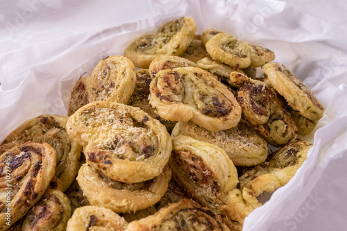 Small alted puff pastries appetizers photo