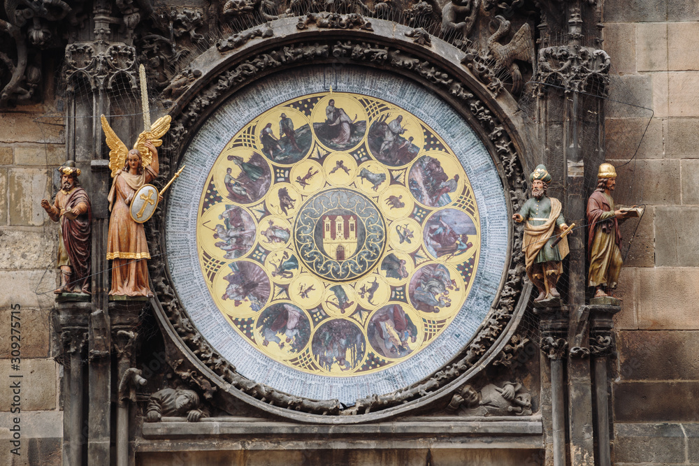 Astronomical Clock Orloj closeup in Czech Republic, Europe. Vintage style. Prague clock tower detail. Clock Prague on Old Town Hall. Town Hall Church of Our Lady before Tyn in Prague, Czech Republic