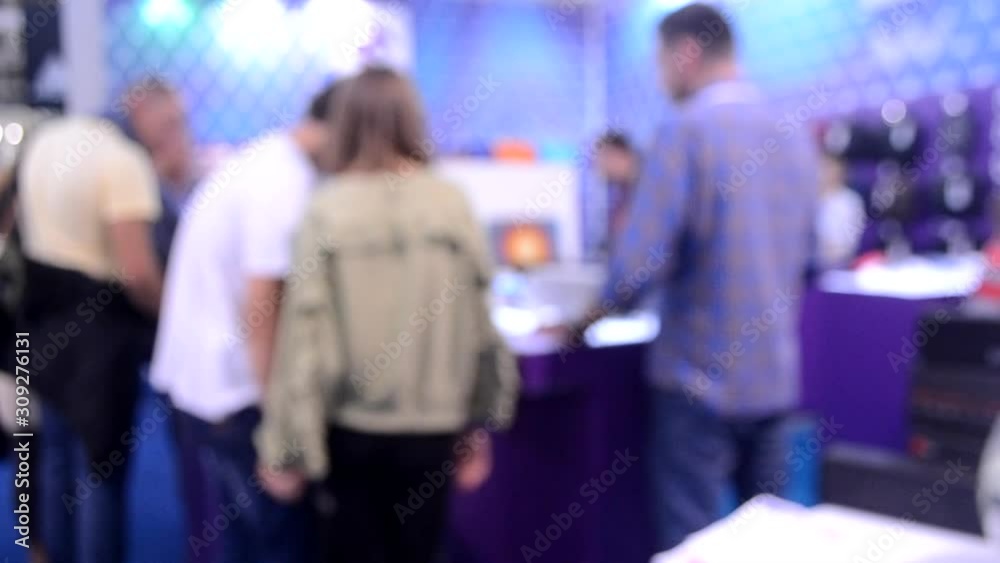 Blurred background sellers with customers store