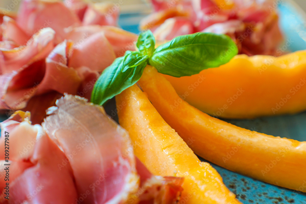 detail of fresh summer aperitif with melon, casertano black pig ham detail of fresh summer aperitif with melon, casertano black pig ham