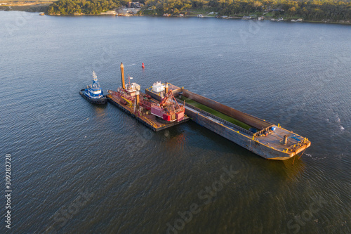 Aerial view of river dredging equipment in St. Johns River. 