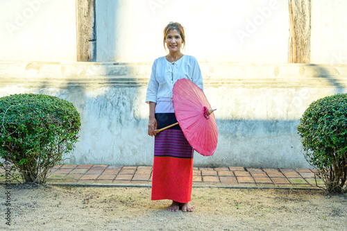 Thai woman with Lanna style background photo