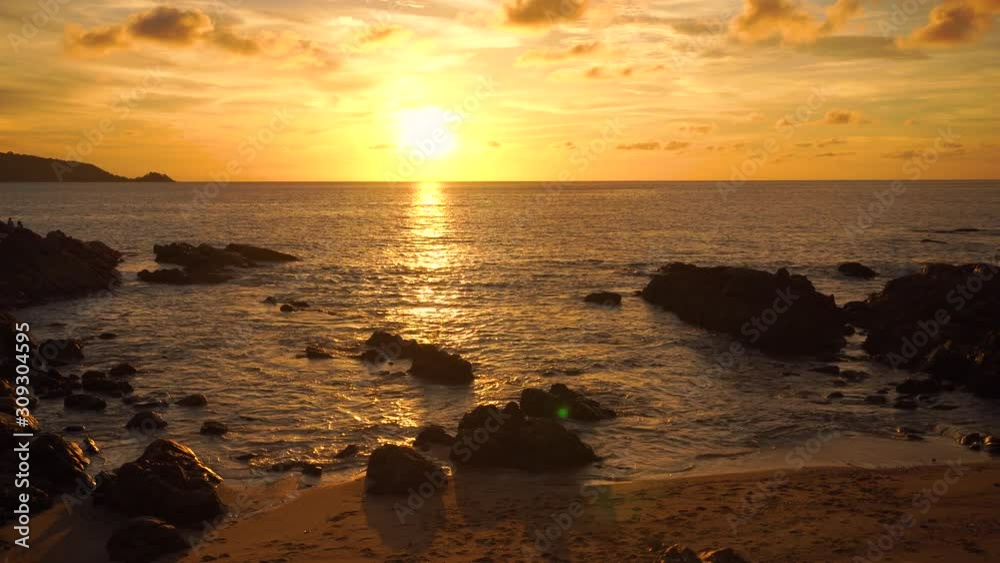 Beautiful tropical beach with sunset sky and white cloud background. Summer vacation and nature environment concept.