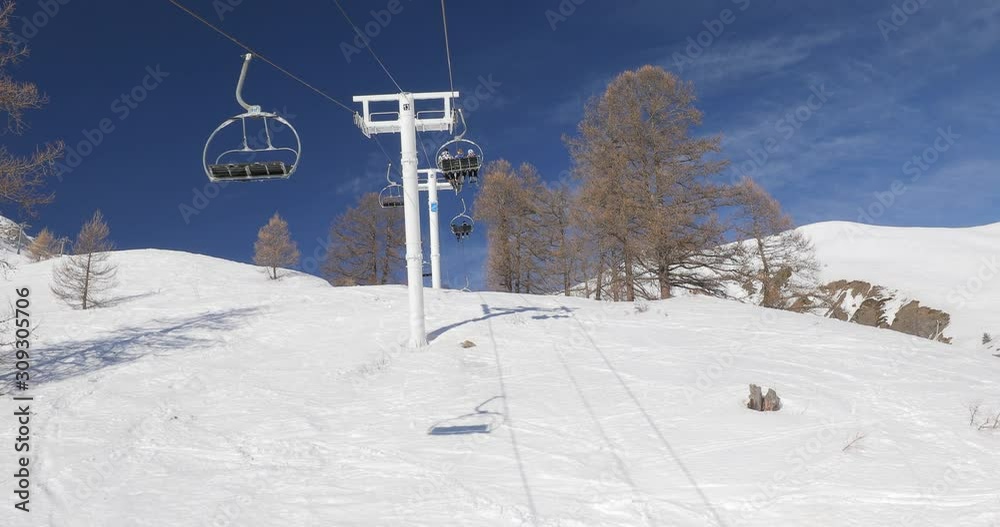 Using ski lift in the Alps