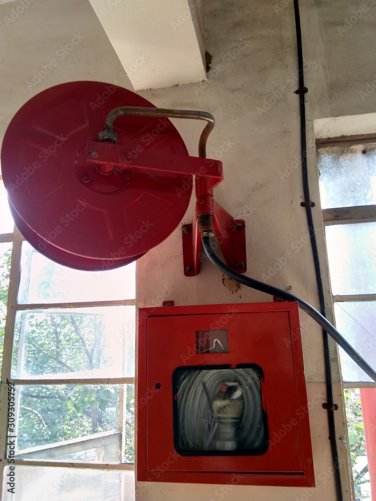 Fire hose reel and hydrant box Stock Photo Adobe Stock