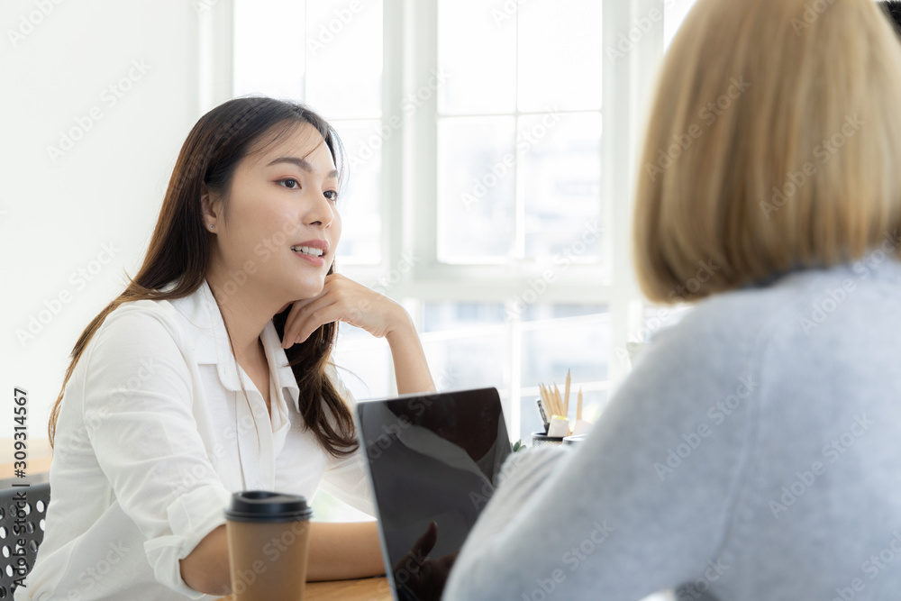 Asian business people discussing team of young asian entrepreneurs discussing business, Asia business team meeting discussion talking. Asian business people discussing team of young asian entrepreneurs discussing business, Asia business team meeting discussion talking.