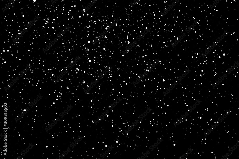 Chaotic white star bokeh on a isolated black background. falling blurry ...