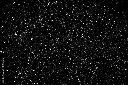 Chaotic white star bokeh on a isolated black background. falling blurry bokeh snow overlay  starry sky. white spots on black background  white drops and spots. abstraction.