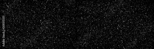 Chaotic white star bokeh on a isolated black background. falling blurry bokeh snow overlay, starry sky. white spots on black background, white drops and spots. abstraction.