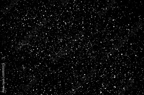 Chaotic white star bokeh on a isolated black background. falling blurry bokeh snow overlay, starry sky. white spots on black background, white drops and spots. abstraction.