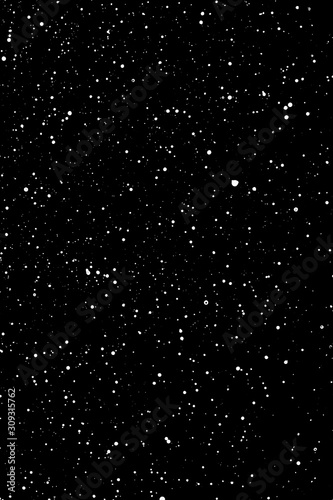 Chaotic white star bokeh on a isolated black background. falling blurry bokeh snow overlay, starry sky. white spots on black background, white drops and spots. abstraction.