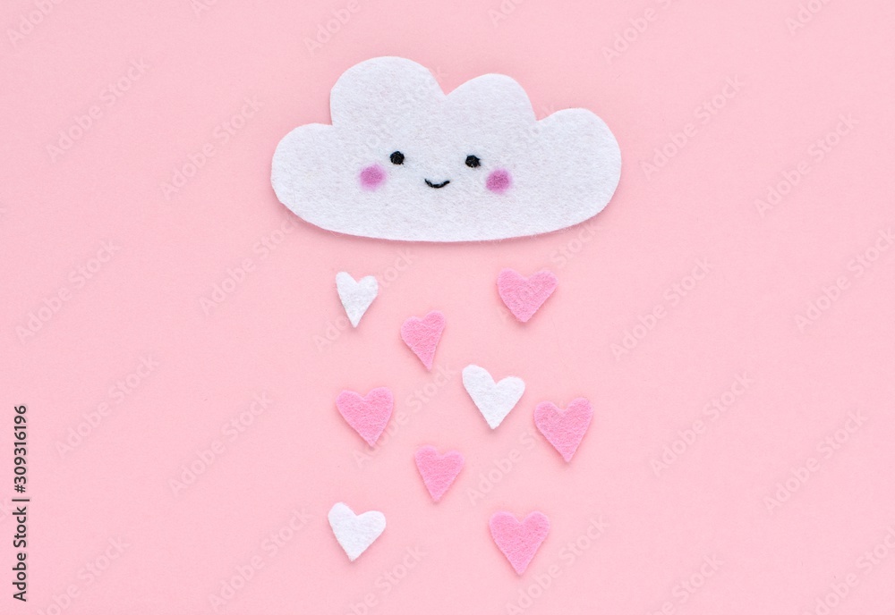 Valentines day concept, cute smiling face cloud made and hearts made from felt fabric, kawaii style, oink background. Valentines day concept, cute smiling face cloud made and hearts made from felt fabric, kawaii style, oink background.