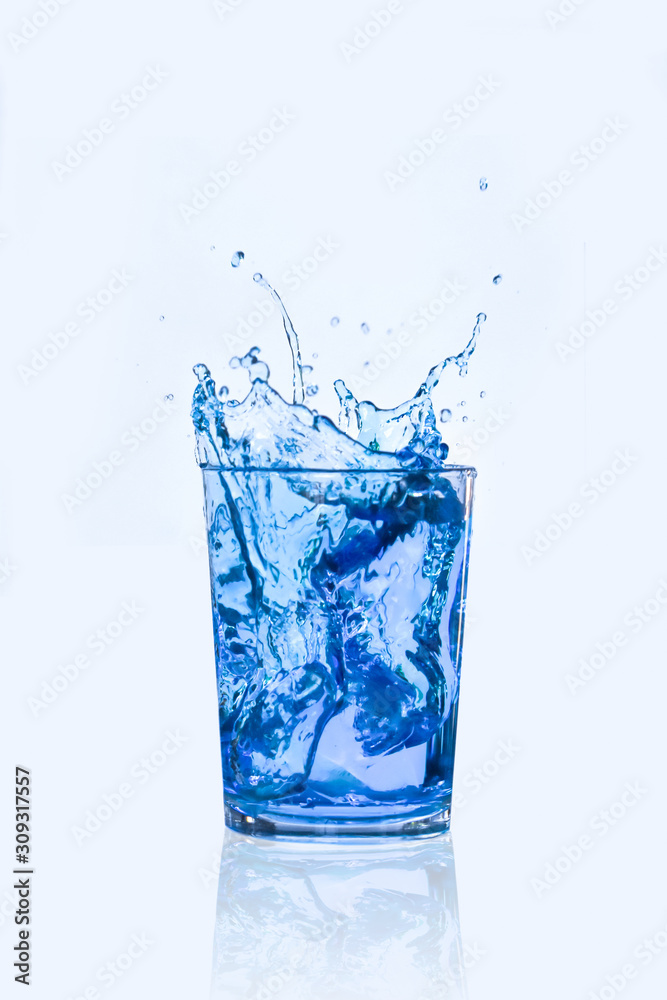 glass of water with splash isolated on white background glass of water with splash isolated on white background