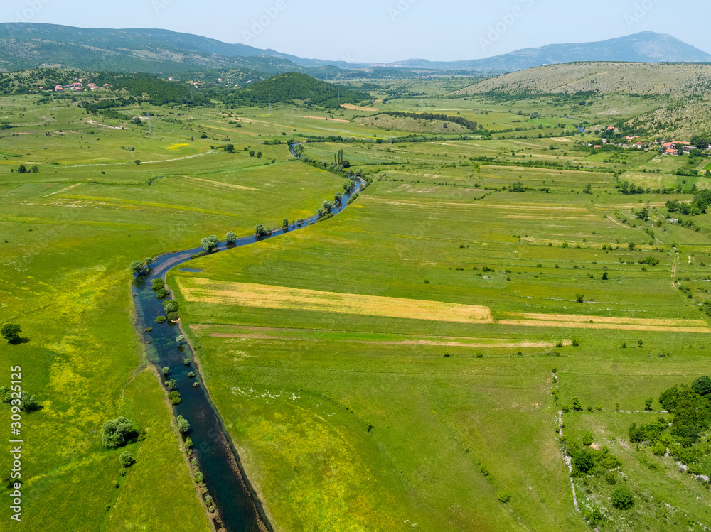 The Čikola River in the karst plain, Croatia