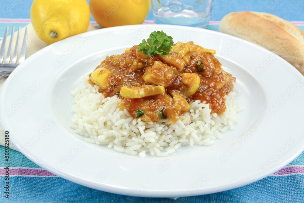 squid in tomato sauce on a plate squid in tomato sauce on a plate