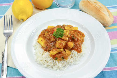 squid in tomato sauce on a plate