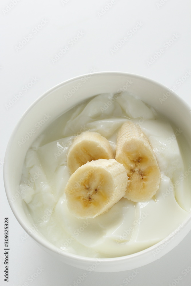 Banana and honey on yogurt for healthy breakfast Banana and honey on yogurt for healthy breakfast