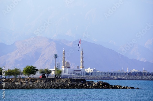 panoramic view on Dibba coastline by foggy mountains photo