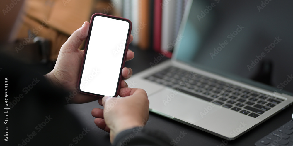 Close-up view of professional businessman holding bank screen smartphone Close-up view of professional businessman holding bank screen smartphone