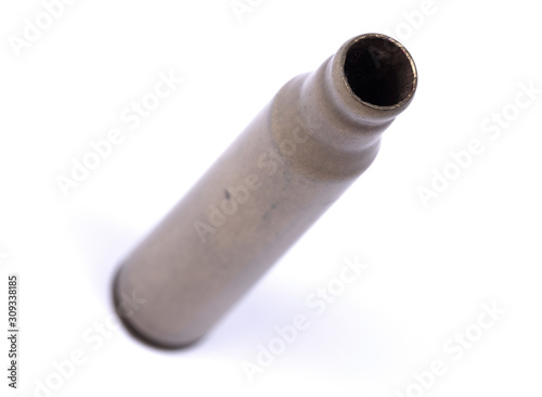 Isolated macro shot of M-16 5. 56mm cartridge