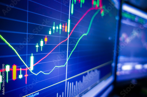 Blue stock exchange market graph on LED screen for business analysis. Finance and economic graphs.