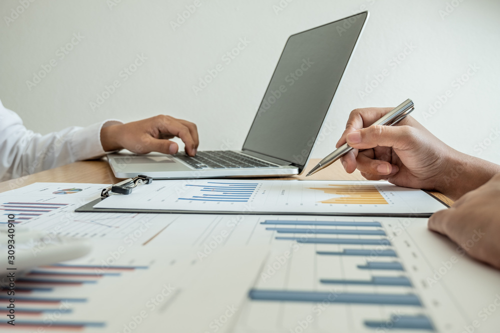 Two business leader discussing the charts and graphs showing the results, Planning to start new strategy for big success Two business leader discussing the charts and graphs showing the results, Planning to start new strategy for big success