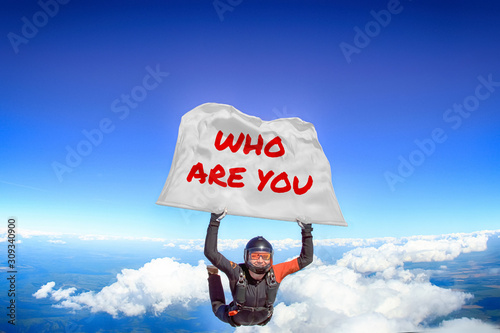 Who are you. Flag in skydiving. People in free fall.Teampleat skydiver. Extreme sport.